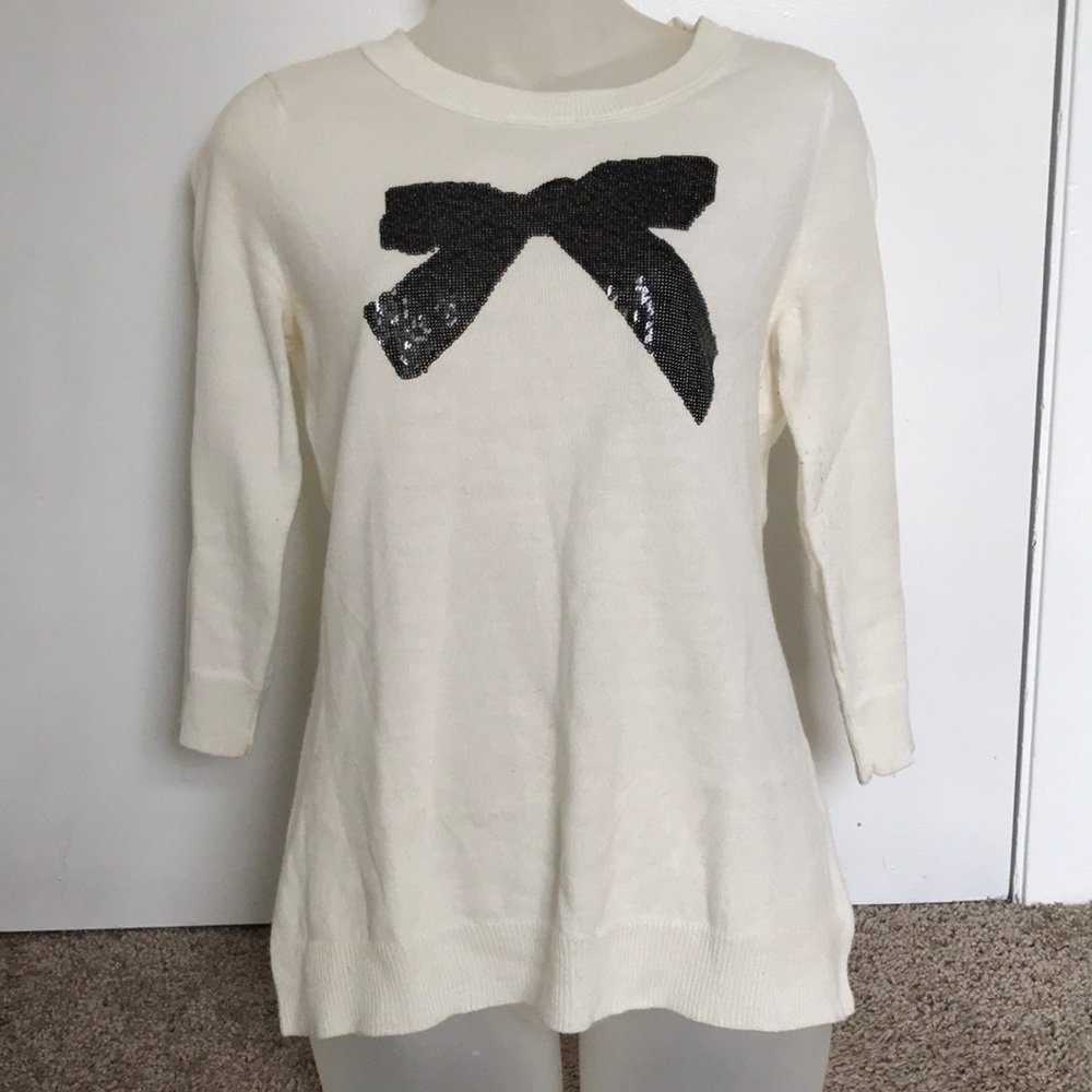 New York & Company sparkle bow sweater.